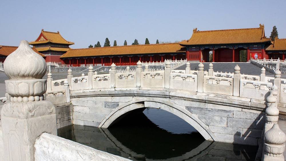 Bridge over the river with golden waters